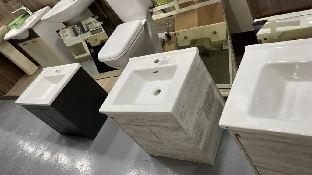 Compact dark and light wood vanity units with square ceramic sinks